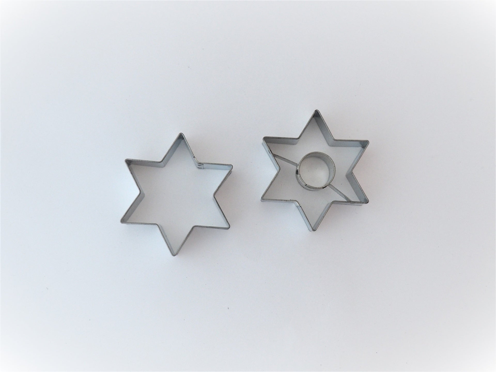 AUSSTECHER STERN MIT LOCH